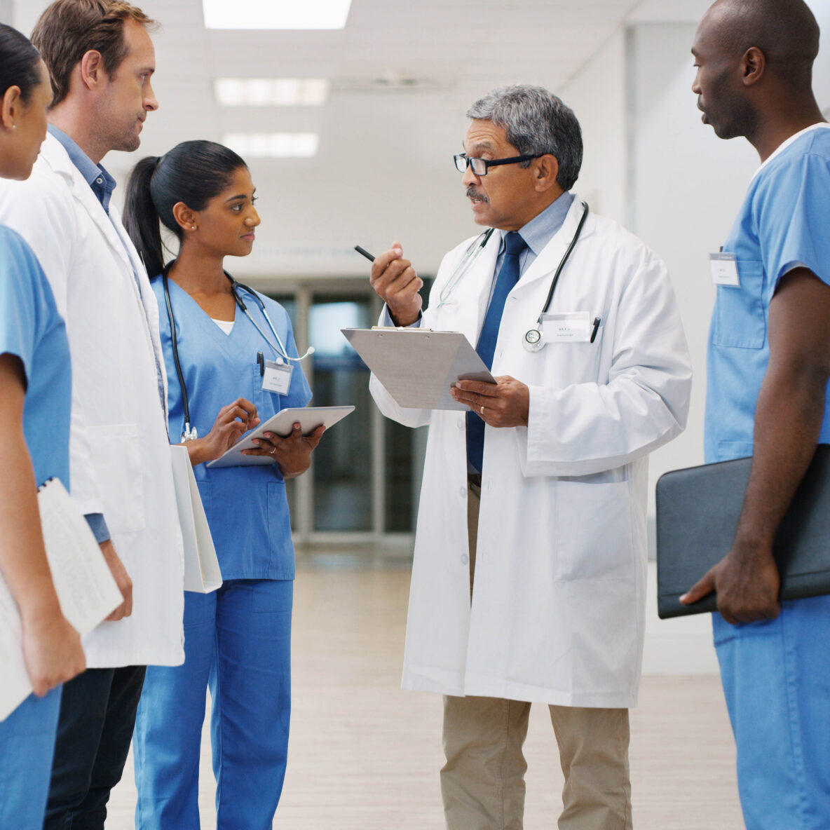 Shot of a group of medical practitioners having a discussion in a hospital